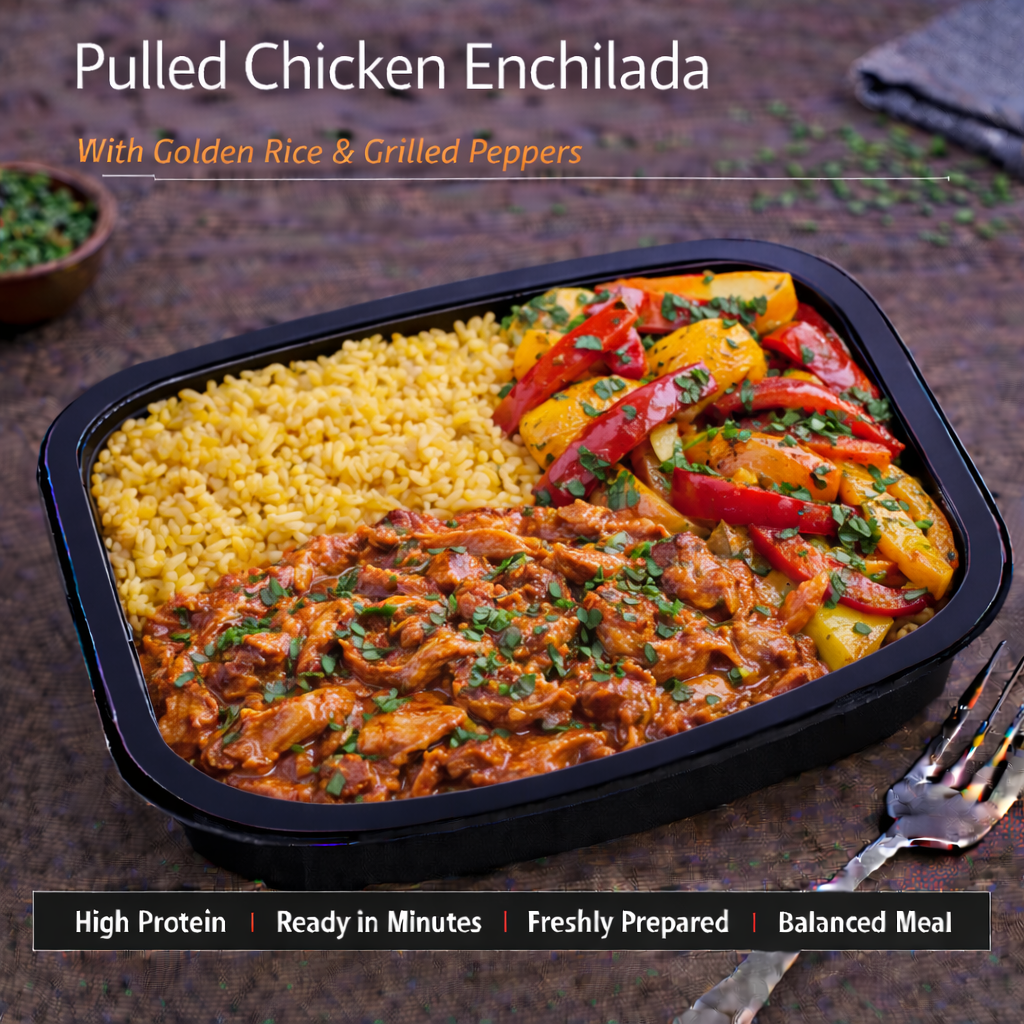 Pulled Chicken Enchilada served with golden rice and grilled peppers